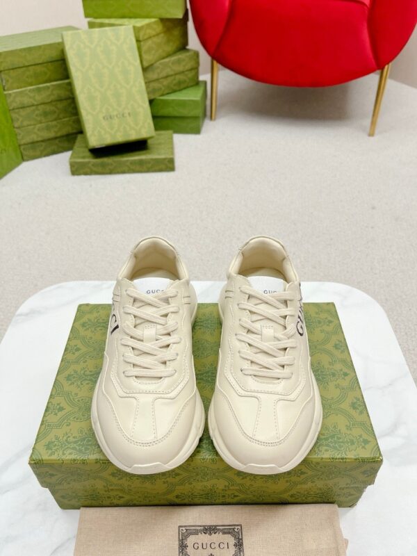sy_no_64F0A198F01C4E2FFA255155F1BF7702_1 Gucci Rhyton Leather Sneaker in Off-White