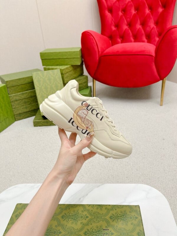 sy_no_64F0A198F01C4E2FFA255155F1BF7702_3 Gucci Rhyton Leather Sneaker in Off-White