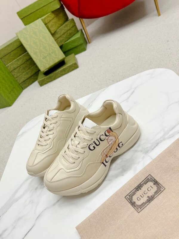 sy_no_64F0A198F01C4E2FFA255155F1BF7702_4 Gucci Rhyton Leather Sneaker in Off-White