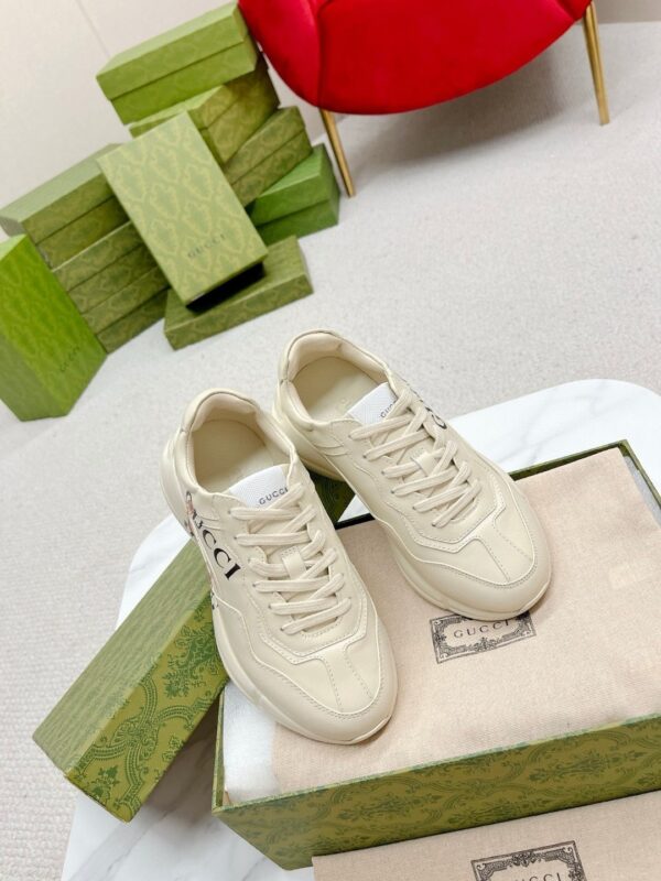 sy_no_64F0A198F01C4E2FFA255155F1BF7702_5 Gucci Rhyton Leather Sneaker in Off-White