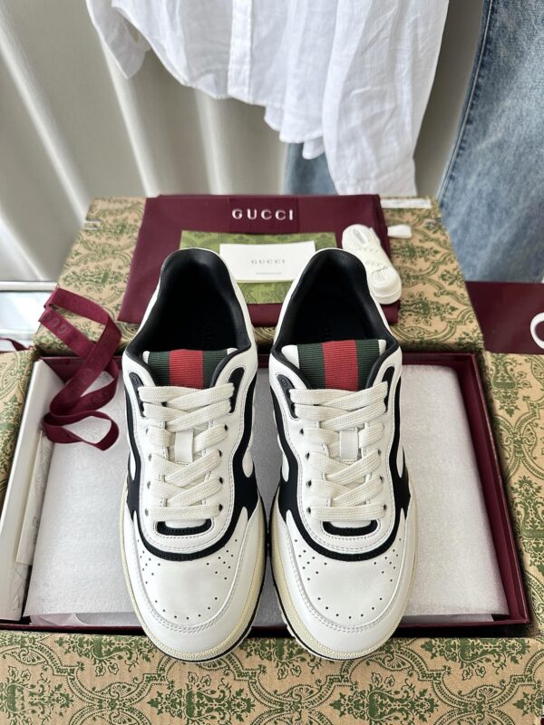 sy_no_777DF369D0ADB8D5F55D8B489BD13D14_0 Gucci B Leather Sneaker in White & Black