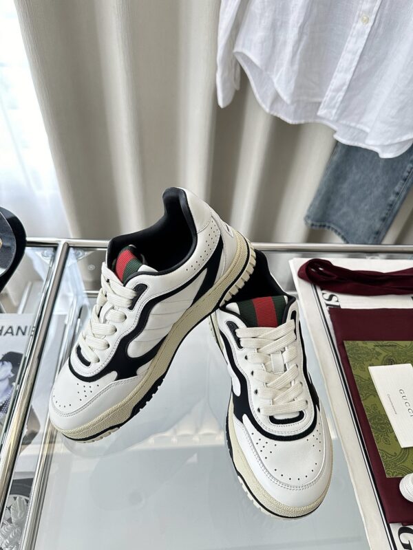 sy_no_777DF369D0ADB8D5F55D8B489BD13D14_3 Gucci B Leather Sneaker in White & Black