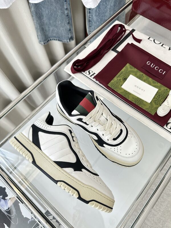sy_no_777DF369D0ADB8D5F55D8B489BD13D14_4 Gucci B Leather Sneaker in White & Black