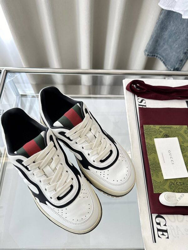 sy_no_777DF369D0ADB8D5F55D8B489BD13D14_5 Gucci B Leather Sneaker in White & Black