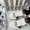 sy_no_777DF369D0ADB8D5F55D8B489BD13D14_6 Gucci B Leather Sneaker in White & Black