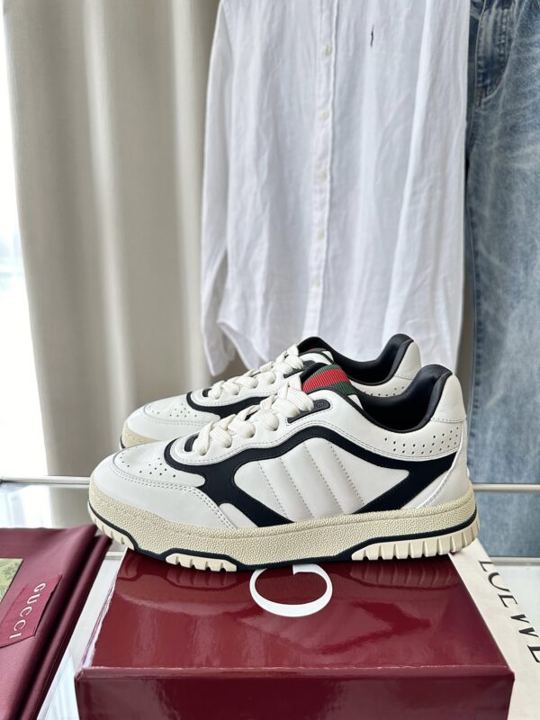 sy_no_777DF369D0ADB8D5F55D8B489BD13D14_7 Gucci B Leather Sneaker in White & Black