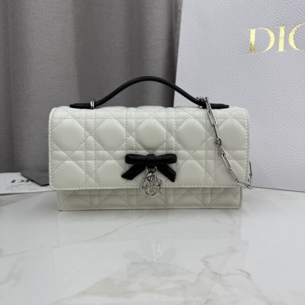 sy_no_796916D3205305F819890B74D2EBBAA1_0 My Dior Mini Pearl Chain Bag – Ivory & Black Bow