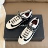 Chanel Retro Running Sneakers in Beige & Black