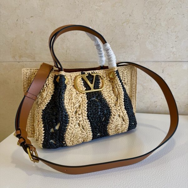 sy_no_7A3186B27EE2AA5402AC20E4F0B8167C_1 Valentino Spring/Summer 2026 Raffia Woven Tote Bag – Black and Apricot