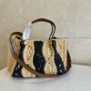sy_no_7A3186B27EE2AA5402AC20E4F0B8167C_6 Valentino Spring/Summer 2026 Raffia Woven Tote Bag – Black and Apricot