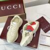 sy_no_7D161DF7AA7A623F2328F48727E82C49_1 Gucci Rhyton Strawberry Print Sneaker in Ivory Leather