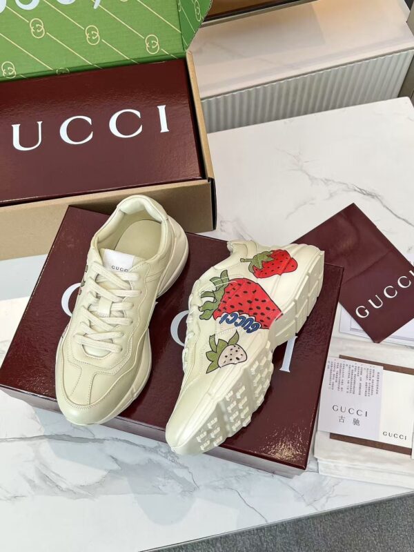 sy_no_7D161DF7AA7A623F2328F48727E82C49_1 Gucci Rhyton Strawberry Print Sneaker in Ivory Leather