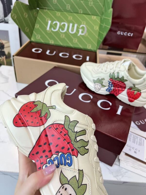 sy_no_7D161DF7AA7A623F2328F48727E82C49_7 Gucci Rhyton Strawberry Print Sneaker in Ivory Leather