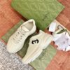 sy_no_7F5815E2E4EB510AFD17E649CF16BE46_2 Gucci Rhyton Leather Sneaker in Off-White with Black Interlocking G Logo