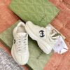 sy_no_7F5815E2E4EB510AFD17E649CF16BE46_3 Gucci Rhyton Leather Sneaker in Off-White with Black Interlocking G Logo