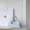 sy_no_850FCE39383CF63DFFCD3D16881C3F4E_0 Toujours Small Horizontal Bag – Ice Blue