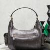 sy_no_853F838192E1780C39F0158A785EBDB1_1 Miu Miu Women's Vintage-Style Biker Shoulder Bag