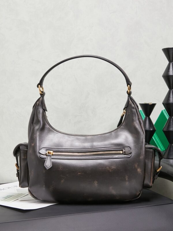 sy_no_853F838192E1780C39F0158A785EBDB1_1 Miu Miu Women's Vintage-Style Biker Shoulder Bag