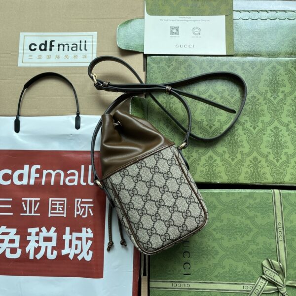 sy_no_85C4482066EDF53BE7EFF970EAC49155_1 Gucci Interlocking G GG Supreme Mini Drawstring Bucket Bag – Brown