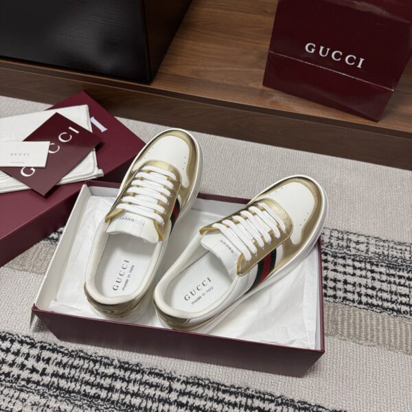 sy_no_86FA7790F9D44F194E522EA0D4CC5C71_5 Gucci Re-Web Sneaker in Metallic Gold & White Leather with Web Stripe