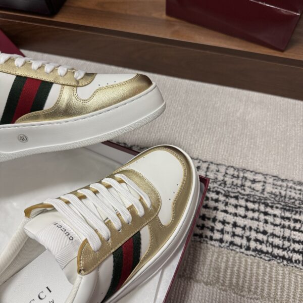 sy_no_86FA7790F9D44F194E522EA0D4CC5C71_8 Gucci Re-Web Sneaker in Metallic Gold & White Leather with Web Stripe