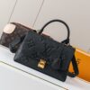 Madeleine Medium Handbag in Monogram Empreinte Embossed Leather