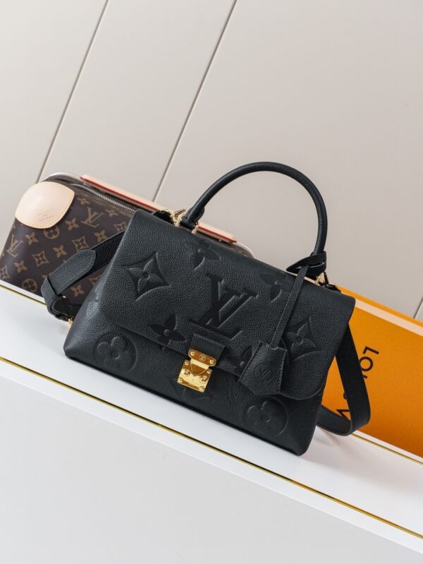Madeleine Medium Handbag in Monogram Empreinte Embossed Leather