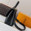 Madeleine Medium Handbag in Monogram Empreinte Embossed Leather