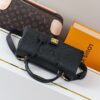 Madeleine Medium Handbag in Monogram Empreinte Embossed Leather