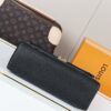 Madeleine Medium Handbag in Monogram Empreinte Embossed Leather