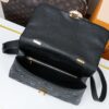 Madeleine Medium Handbag in Monogram Empreinte Embossed Leather