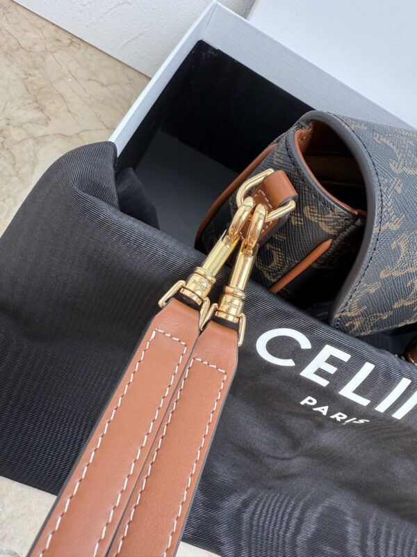 sy_no_89052C2DCD6203E6D5C7E23B16AD2AF3_5 Folco Saddle Bag – Signature Monogram