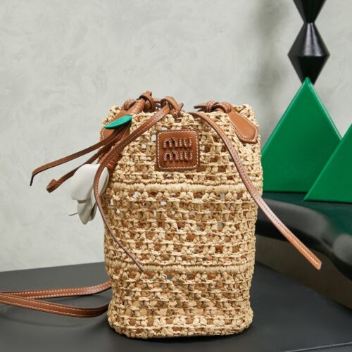sy_no_8C6311B53EBE358DF99F0FD2DC2E61E0_0 Miu Miu Raffia Open-Weave Bucket Bag – Hand-Crocheted Summer Beach Bag with Leather Charm; Versatile Shoulder & Crossbody Style