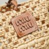 Miu Miu Raffia Open-Weave Bucket Bag – Hand-Crocheted Summer Beach Bag with Leather Charm; Versatile Shoulder & Crossbody Style