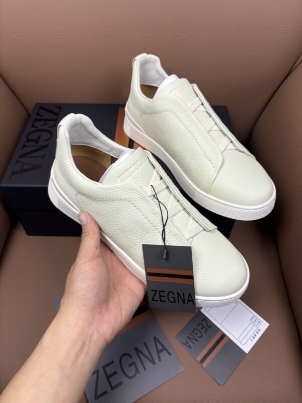 sy_no_8E1A3F917809E6A7942E9329623205E1_1 Off-White & Glacier White Textured Leather Slip-On Sneakers