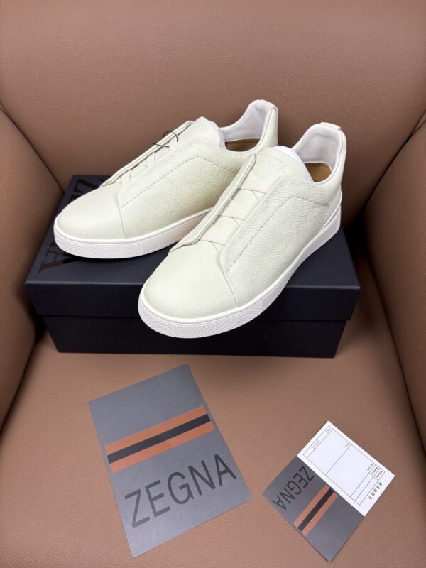 sy_no_8E1A3F917809E6A7942E9329623205E1_5 Off-White & Glacier White Textured Leather Slip-On Sneakers