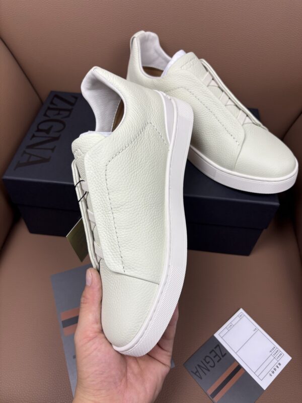 sy_no_8E1A3F917809E6A7942E9329623205E1_6 Off-White & Glacier White Textured Leather Slip-On Sneakers