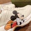 sy_no_93F0E3B7B1503ACE509FE362D8B26E69_6 Disney x Gucci Rhyton Mickey Mouse Sneaker – Ivory / Multicolor