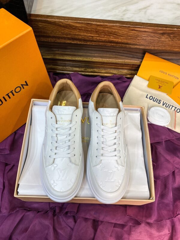 sy_no_9776840670FC1A7017C91BB25F9140EA_0 Louis Vuitton Beverly Hills / Charlie White Embossed Monogram Leather Sneakers