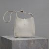 sy_no_9924EBC29CFC0041AB1909943F659D6B_7 Saint Laurent Le 5 À 7 Mini Bucket Bag – Cream White