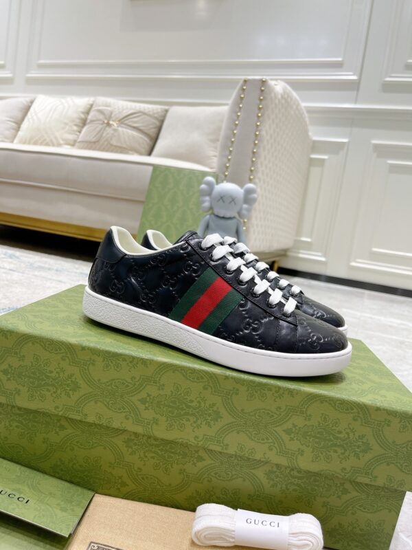 sy_no_99A936E71EA7CB62804C3B92AD336B8B_0 Gucci Ace Black GG Embossed Leather Sneakers