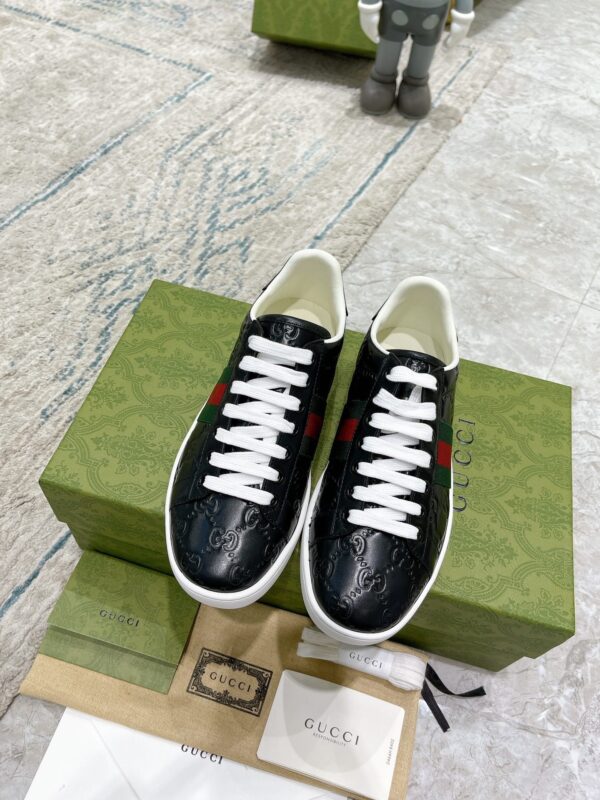 sy_no_99A936E71EA7CB62804C3B92AD336B8B_1 Gucci Ace Black GG Embossed Leather Sneakers