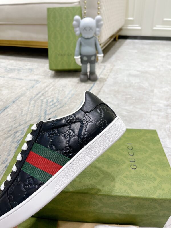 sy_no_99A936E71EA7CB62804C3B92AD336B8B_6 Gucci Ace Black GG Embossed Leather Sneakers