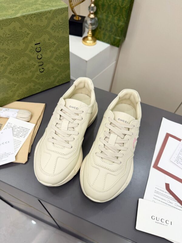 sy_no_9EFA72A7EEB388FAAA6FE9B6494A48B3_2 Gucci Rhyton Leather Sneaker in Off-White with Pink Interlocking G Logo