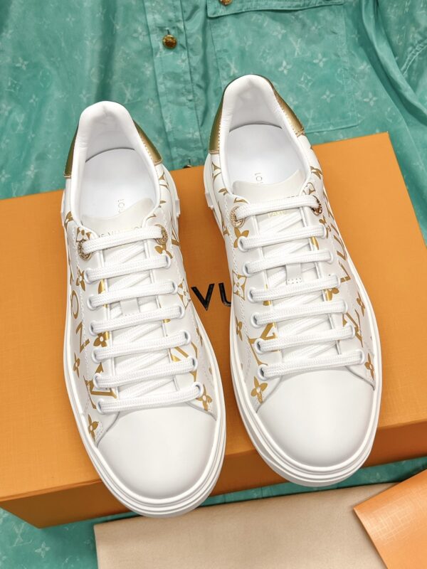 sy_no_A26AA54C5EB37A9398E8F95508F28F23_1 Louis Vuitton Time Out White & Gold Platform Sneakers