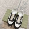 sy_no_A3164D73C8139399F32FC0D77D47DA9C_1 Black & White Embossed Leather Platform Sneakers
