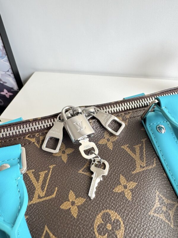 sy_no_AAD872DB9EAA36239425D14FC0F952CD_5 Louis Vuitton Keepall Bandoulière 50 Travel Bag