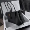 Black Medium Baguette-Style Textured Leather Bag