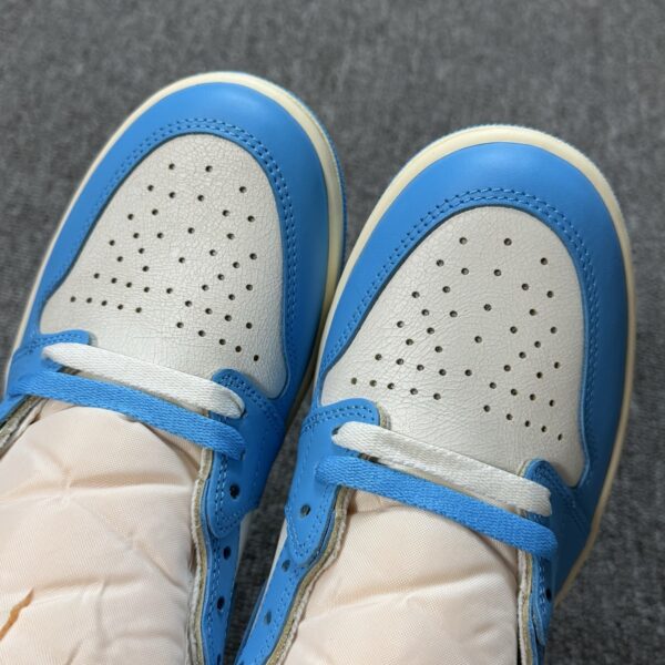 Air Jordan 1 Retro High OG "UNC" White & University Blue Vintage Sneakers