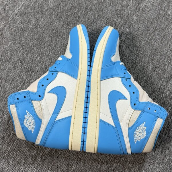 Air Jordan 1 Retro High OG "UNC" White & University Blue Vintage Sneakers
